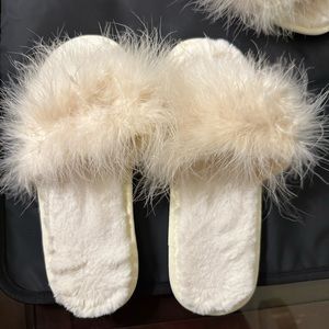 Fluffy white slippers